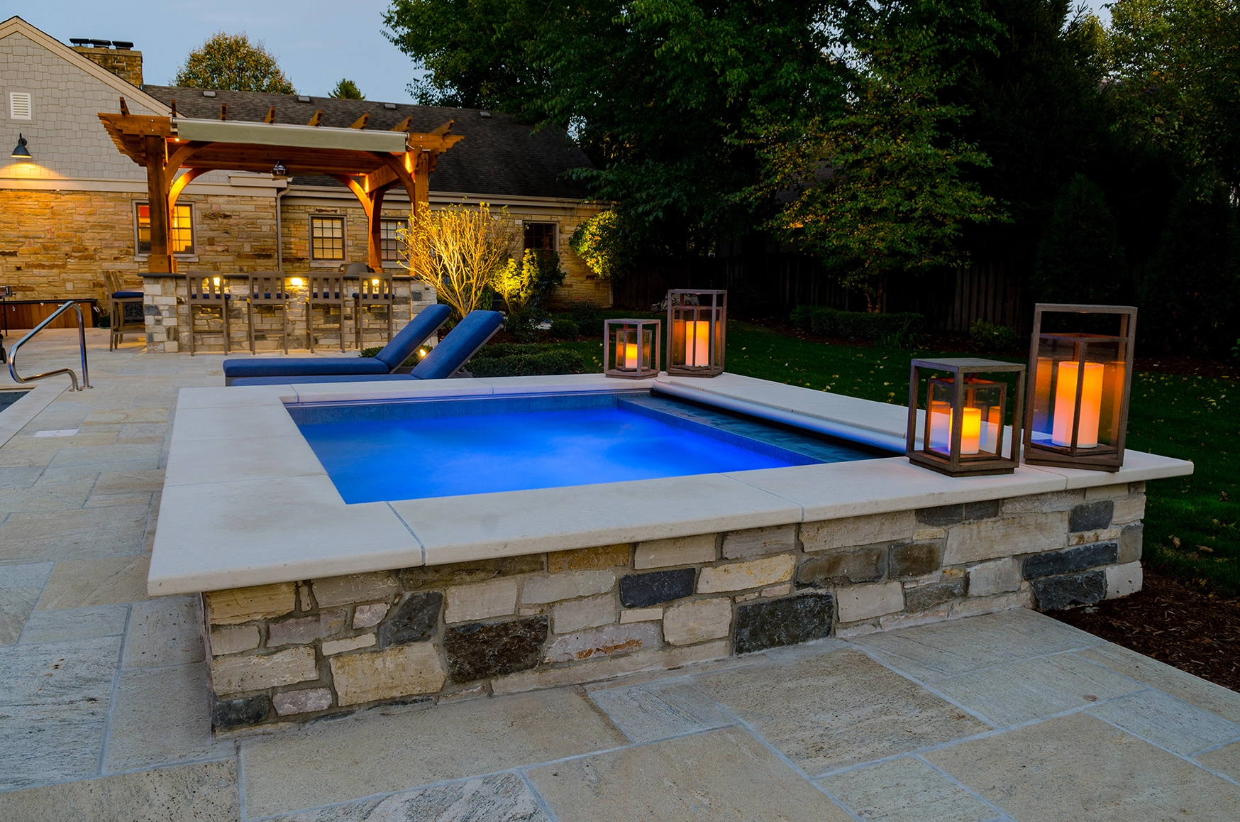 Custom Outdoor stone masonry and hot tub.